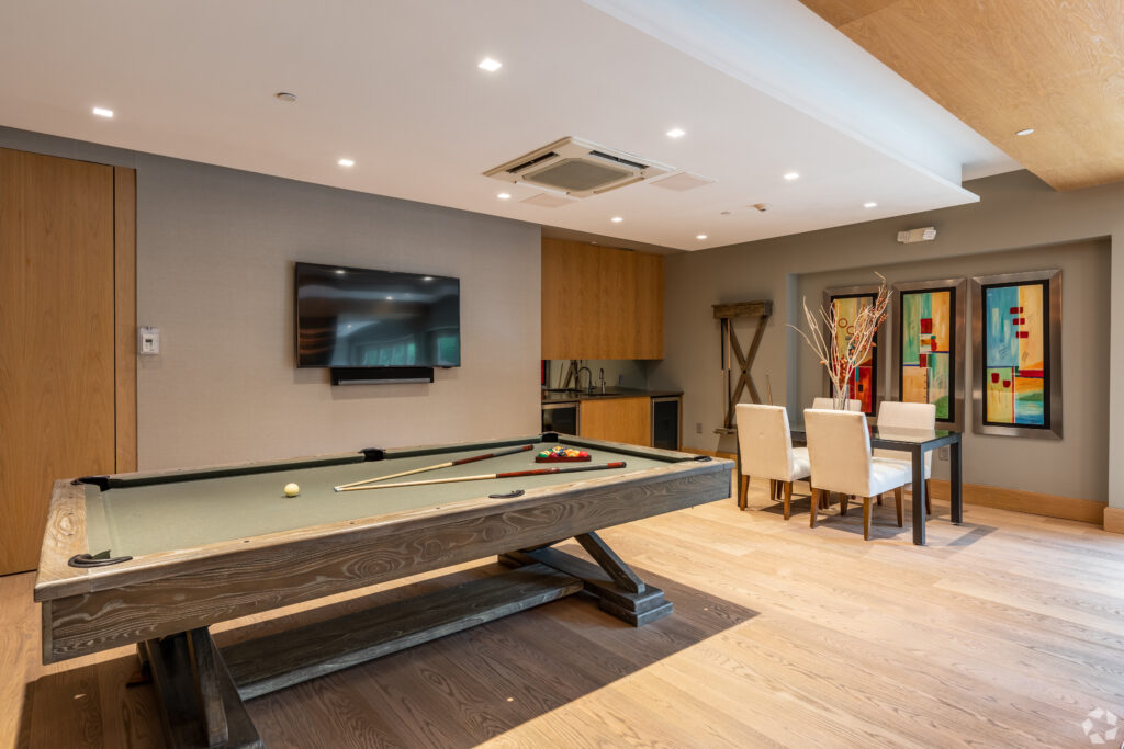 JLofts clubroom with a pool table